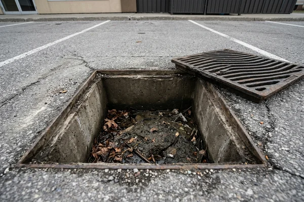 Catch basin sump full of sediment before cleaning